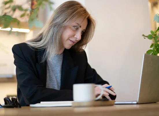 smiling-businesswoman-successful-manager-working-o-2026-02-05-23-09-09-utc