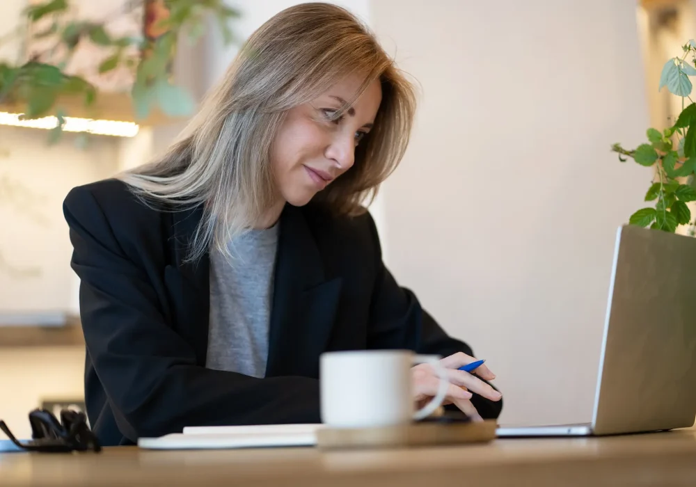 smiling-businesswoman-successful-manager-working-o-2026-02-05-23-09-09-utc